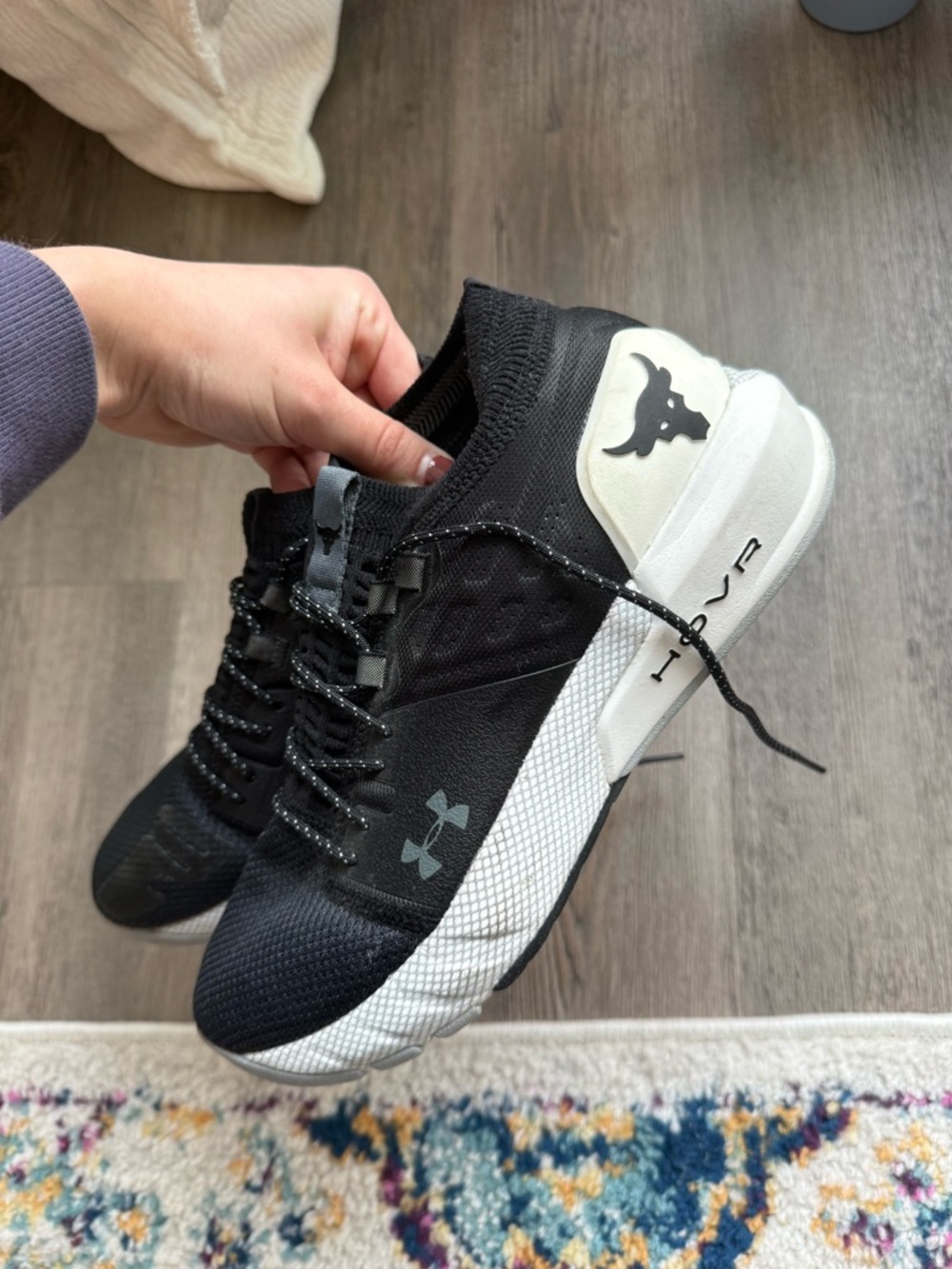 The rock hovr under armour black training shoes